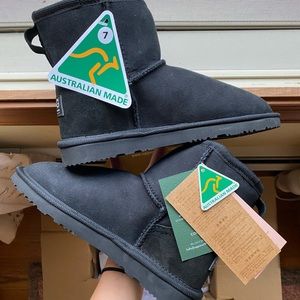 UGG SINCE 1974 Black mini boot with loop